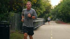 NFL Hall of Fame Quarterback Troy Aikman running on the streets of the Dallas