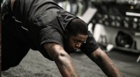 NFL player Trent Brown does sled push drills to improve his athletic performance