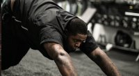 NFL player Trent Brown doing sled push exercises to build athletic performance