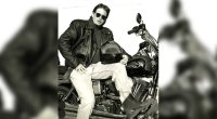 Photographer Bill Dobbins riding a motorcycle