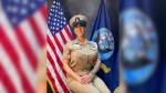 Tanya Corbett posing in her military uniform