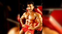 Bodybuilder Samir Bannout wearing red shorts and smirking