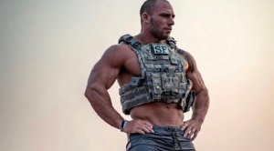 Matt Cable wearing a bulletproof vest outdoors