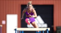 Olympic pole vaulter Alysha Newman running the hurdles on a track
