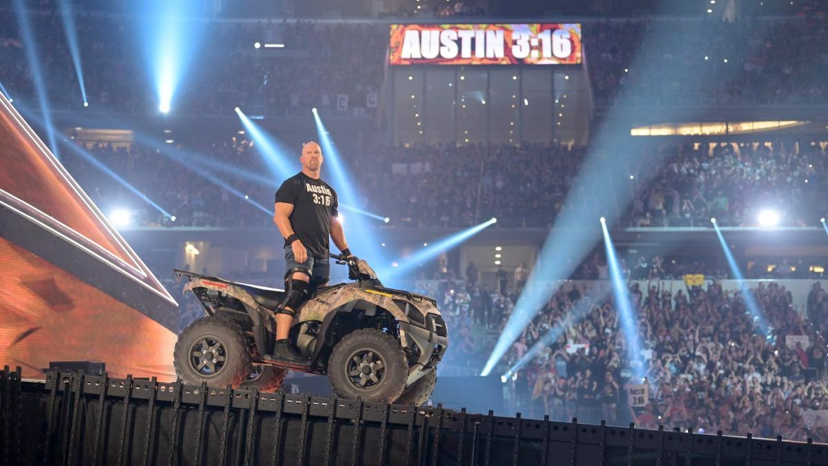 Stone Cold Steve Austin looking at the audience at WrestleMania 38 from the squared circle