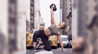 Fitness Coach Sarah performing a kettlebell training exercise in NYC