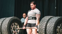 Gabriele Burgholzer deadlifting truck tires attached to a barbell