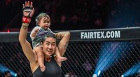 ONE Championship Atomweight title holder Unstoppable Angela Lee holding her baby Ava in the octagon