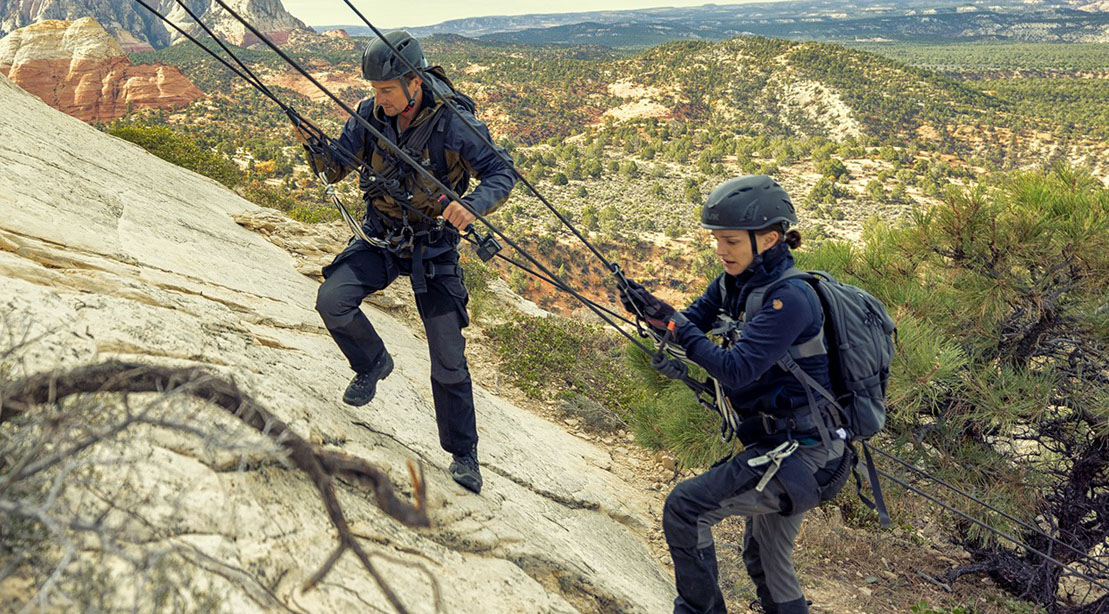 Bear Grylls teaching actress Natalie Portman of Marvel's Thor how to climb a mountain on Disney Plus The Challenge