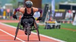Handicapped veteran racing in a wheelchair in the wounded warrior games