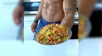 Personal trainer Joshua Bailey serving his recipe for Fourth of July sweet potato fries
