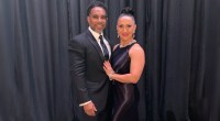 Tony Roberts in a suit with his wife