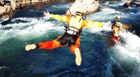 Joshua Carlson jumps out of a helicopter into a body of water
