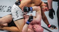 MMA fighter and legendary BJJ Marcus Almeida in a dominating position, providing groundwork against his opponent