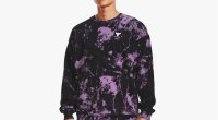 Under the armor, a printed crew sweater interferes