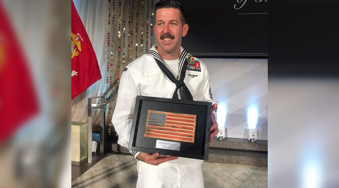 United States Navy sailor Cale Foy recieving an award for his heroic deed
