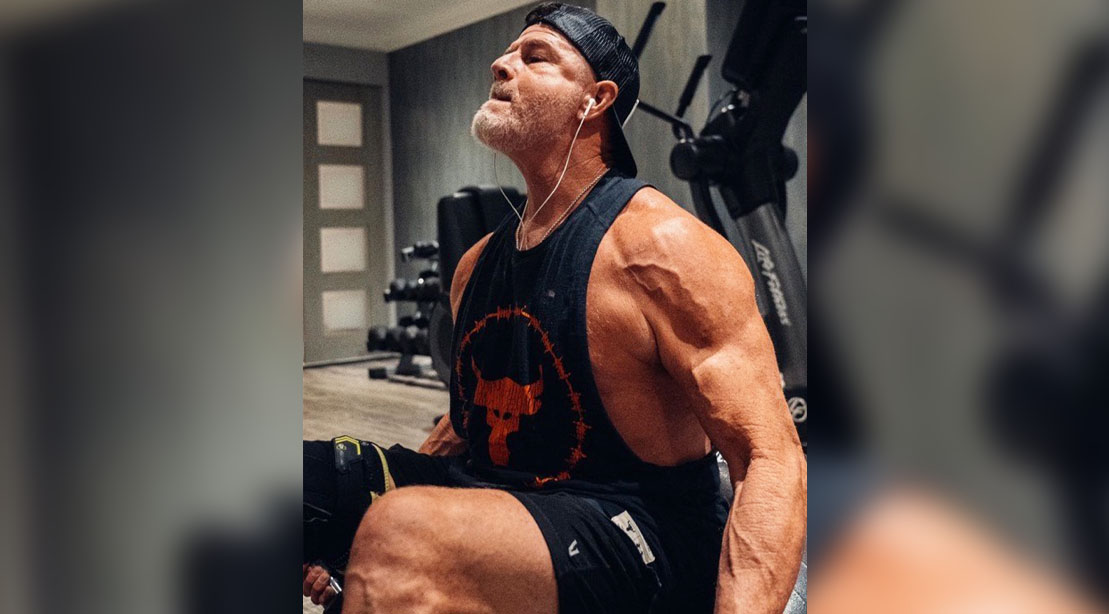 Brent Yates working out at the gym at age 61 performing lunges
