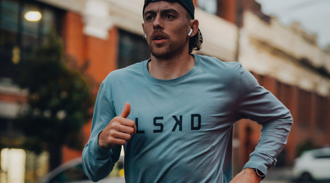 Man running wearing a LSKD shirt