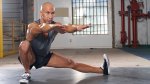Mark Lauren performing his 9 minutes bodyweight workout with a cossack squat exercise