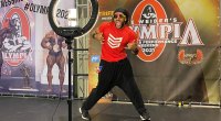 A fitness influencer and social media personality shooting at the Olympia weekend bodybuilding event