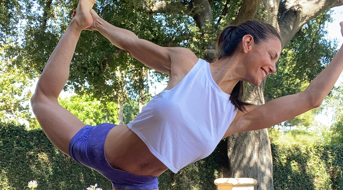 Samantha Harris performing a yoga pose