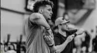 Kansas City Chiefs Patrick Mahomes stretches with Booby Stroupe