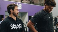 Trainer Bobby Stroupe looking up to Kansas City Chiefs Patrick Mahomes