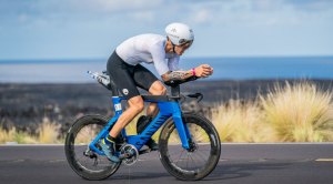 Adam Malonas riding his bike for an Ironman Competition after fueling up with endurance foods