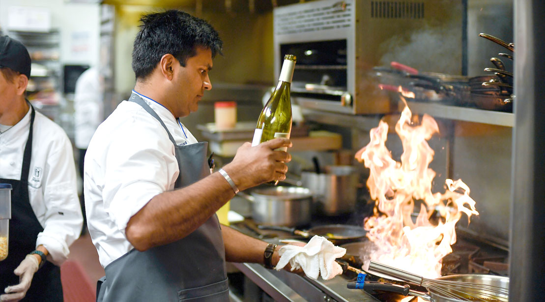 Chef Mohamed Azhar cooking on the line