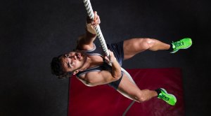 Man exercising with a rope climbing technique