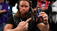 IMPACT’s Brian Myers pointing to his action figure