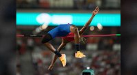 Track and Field Star JaVaughn Harrison completing a high jump attempt