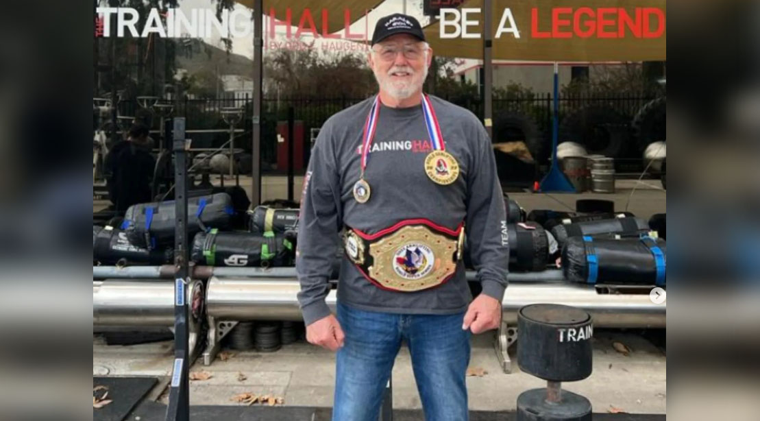 Odd Haugen wearing his champion belt
