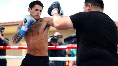 Boxer Ryan Garcia sparring in an outdoor ring