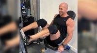 AEW’s Claudio Castagnoli working out with a leg press