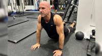 AEW’s Claudio Castagnoli working out with a stretch