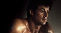 Sylvester Stallone looking in deep thought as Rambo