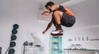 Athletic man performing box jumps while wearing Reebok Nano X4 sneakers