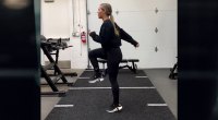 Natalie Kollars performing knee high exercise for her workout
